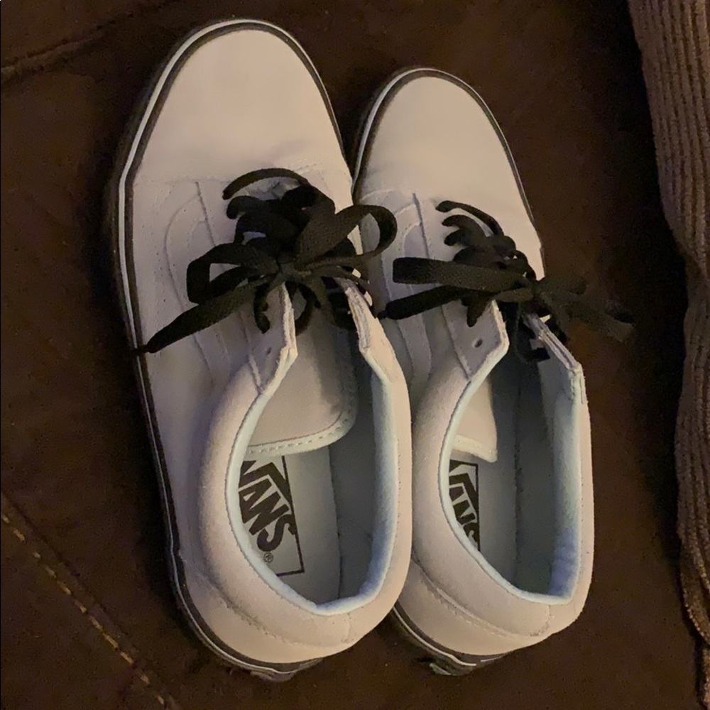 Baby blue vans with black soles